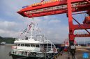 A cargo vessel prepares to depart for Yangpu Port in south China's Hainan Province along the Pinglu Canal at an operation area in Nanning Port, south China's Guangxi Zhuang Autonomous Region, Sept. 16, 2026. China opened a major new canal on Wednesday, giving its landlocked southwest a shortcut to the coast and overseas markets, particularly those in the Association of Southeast Asian Nations (ASEAN), the country's largest trading partner. Built at a cost of 72.7 billion yuan (about 10.75 billion U.S. dollars), the 134.2-kilometer Pinglu Canal runs from Nanning, capital of south China's Guangxi Zhuang Autonomous Region, to the Beibu Gulf, the closest maritime outlet for much of southwest China. (Xinhua/Cao Yiming)